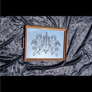 Elegant Brown Framed Mirror with Cherub Design